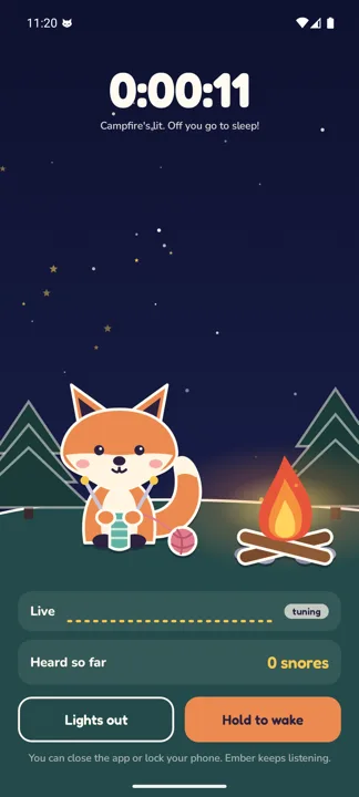 SnoreFox listening screen with Ember by the campfire